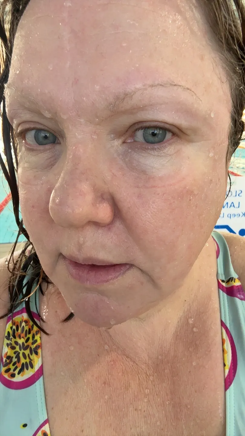 Sandra B., a customer, photographed straight after a 3km swim in NanoClear Flex goggles, with barely a mark around her eyes